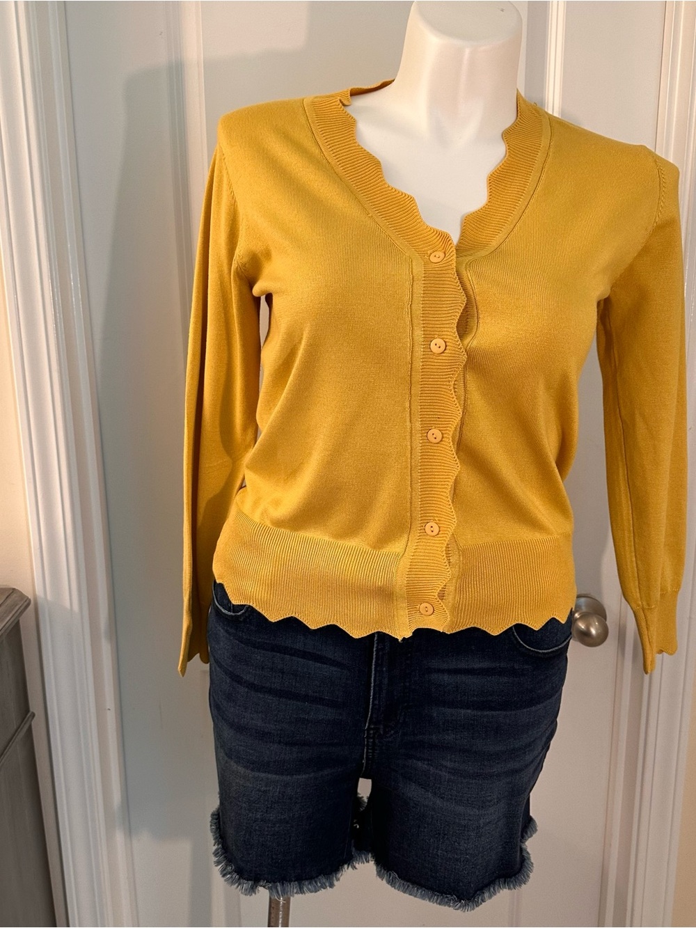 Yellow cardigan. Size large.